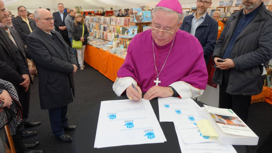 Signature par JC Hollerich